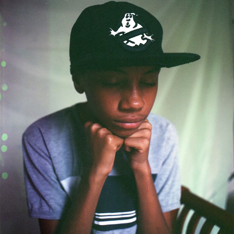 © Andrea Hernández Briceño - Juan David poses for a portrait in his mother’s home in the Petare barrio of Caracas, on April 14, 2021.