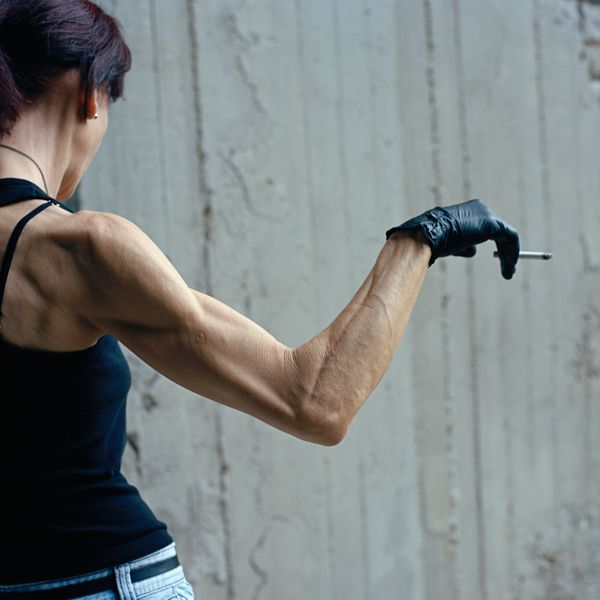 © Michalis Poulas - Hand and cigarete