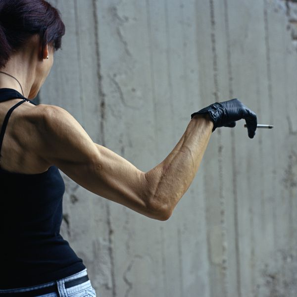 © Michalis Poulas - Hand and cigarete