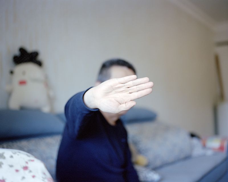 © Lu Wang - Frozen are the winds of time #05 Father who refuses to be photographed