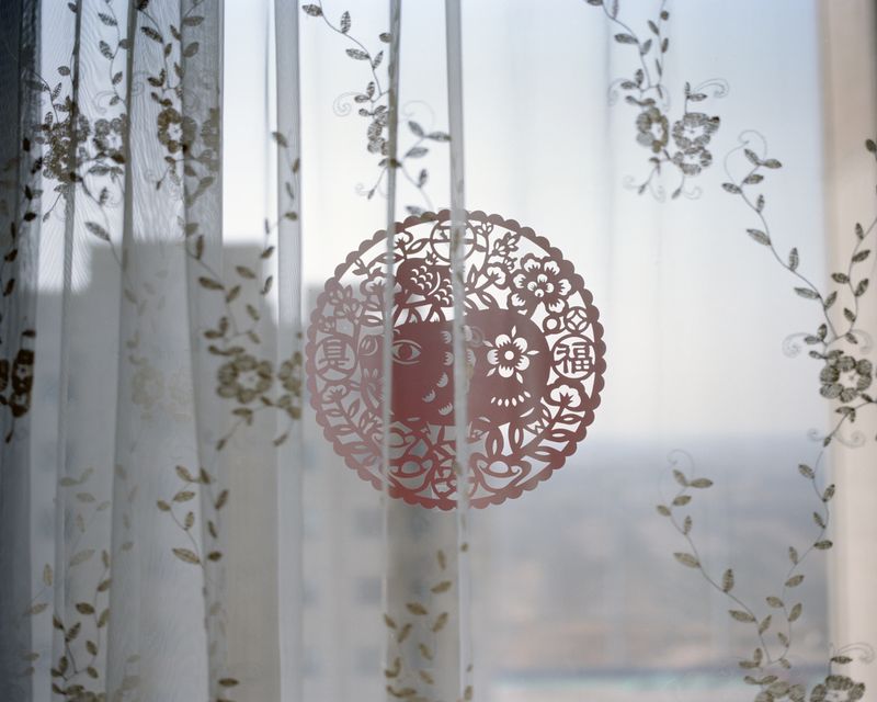© Lu Wang - Frozen are the winds of time #02 Lunar New Year's paper-cutting on the window