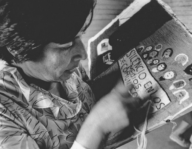 © Julio Etchart - Woman relative of political prisoner making patchworks to sell to make ends meet during the Pinochet years