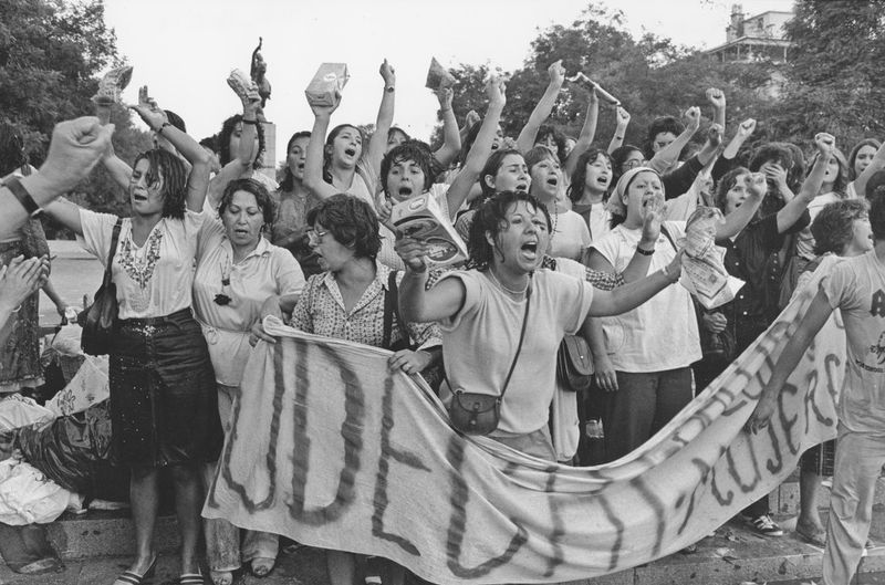 © Julio Etchart - Women soaked by water cannon during a demonstration against Pinochet on International Women's Day. Santiago; Chile, 1985