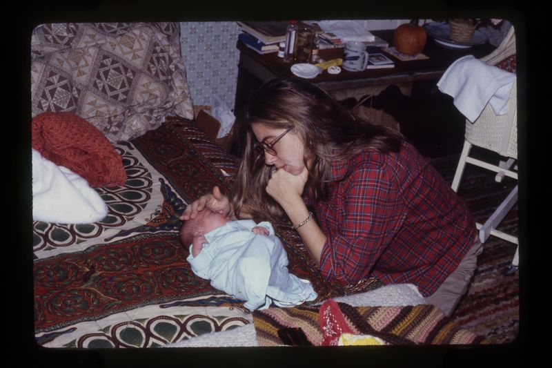 © Alice Proujansky - My mother looks at me in a photograph taken by my father, rephotographed by me.