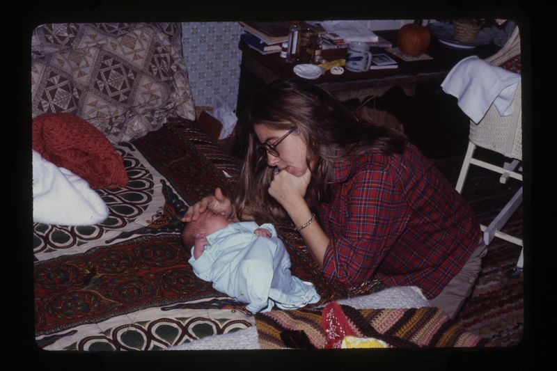 © Alice Proujansky - My mother looks at me in a photograph taken by my father, rephotographed by me.