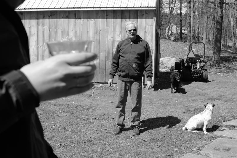 © Alice Proujansky - My dad, Jed Proujansky, with our dogs at his home in Leverett, MA. 2018
