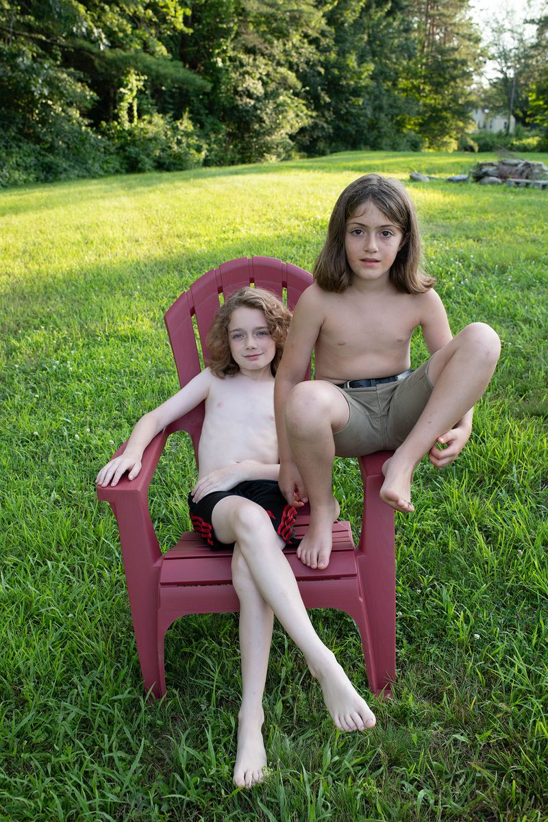 © Alice Proujansky - Will and Theo in the Chair, Northfield, MA, 2023. Inkjet Print, 15 x 22 in.