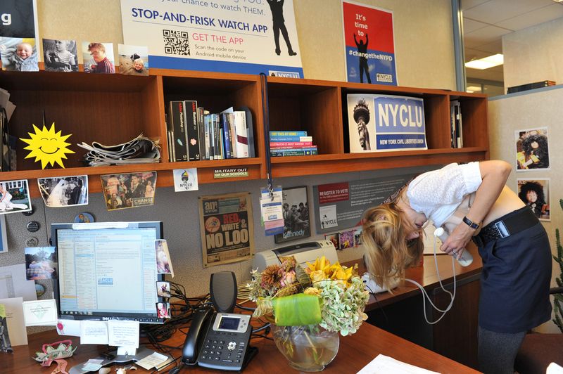 © Alice Proujansky - Jen Carnig pumps breast milk in her office at the New York Civil Liberties Union in New York, NY.