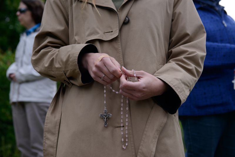 © Alice Proujansky - Catholic anti-abortion protesters pray across the street from A Preferred Women's Health Center.