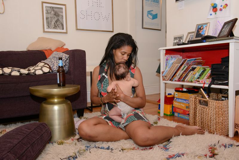 © Alice Proujansky - Petrushka Bazin Larsen holds her second daughter, Zadie Larsen, at home in New York, NY.