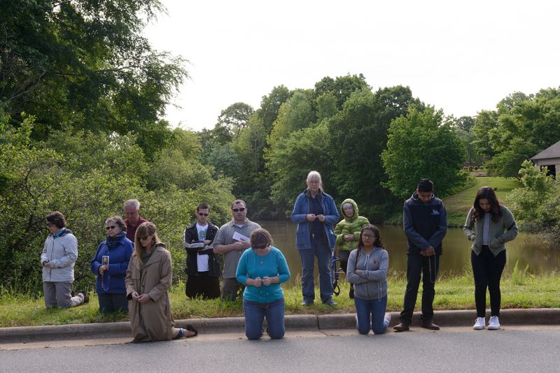© Alice Proujansky - Catholic anti-abortion protesters pray across the street from A Preferred Women's Health Center.