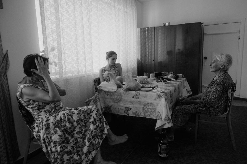 © Dara Petrova - End of the dinner.  Ukraine 2023