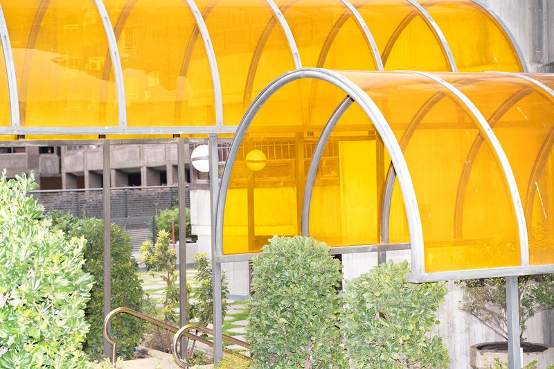 © Manuela Lorente - 6_”Torres Blancas” building entrance. - Well I'll go to mass tomorrow. At least he catches us confessed. Are you coming?