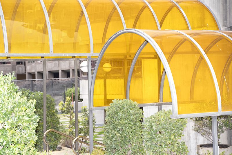 © Manuela Lorente - 6_”Torres Blancas” building entrance. - Well I'll go to mass tomorrow. At least he catches us confessed. Are you coming?