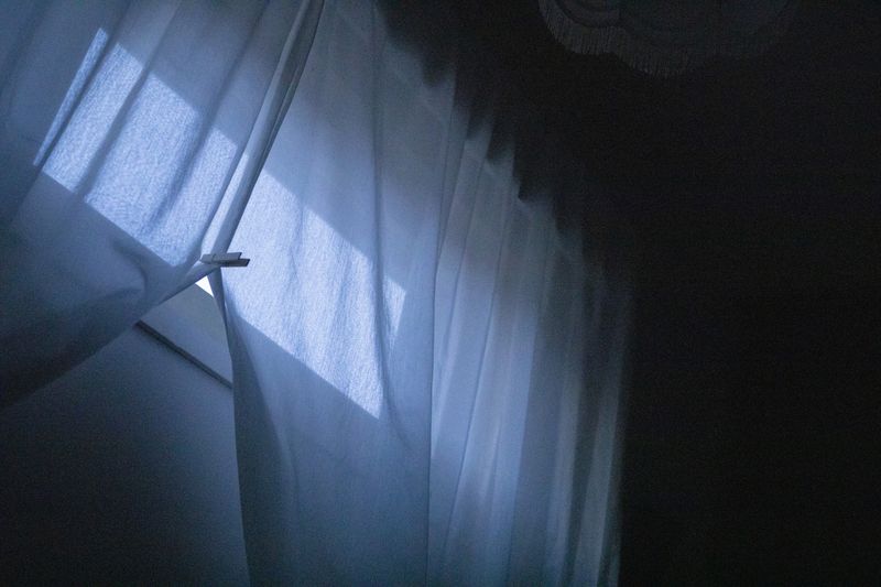 © Saara Tuominen - Image from the I saw my own reflection, warping as the lake lived photography project