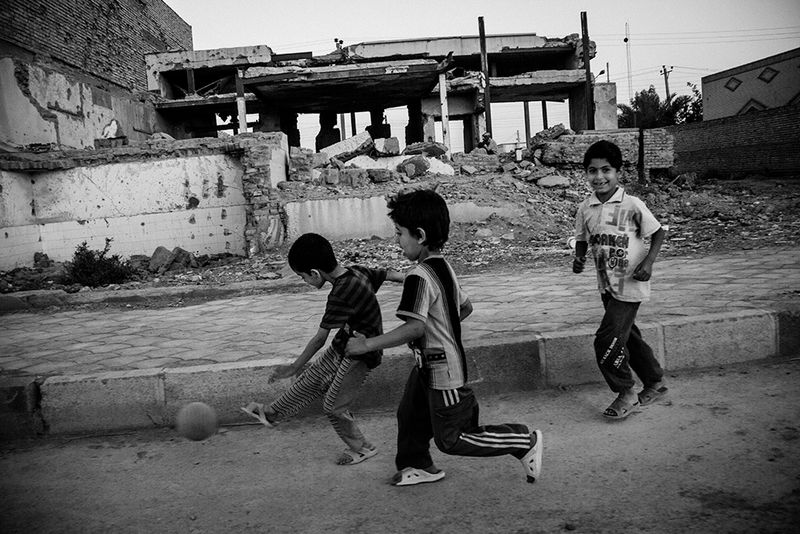 © Fatemeh Behboudi - children are playing infront of Hoveyda house . Mr hoveyda was Prime Minister of Shah of iran .