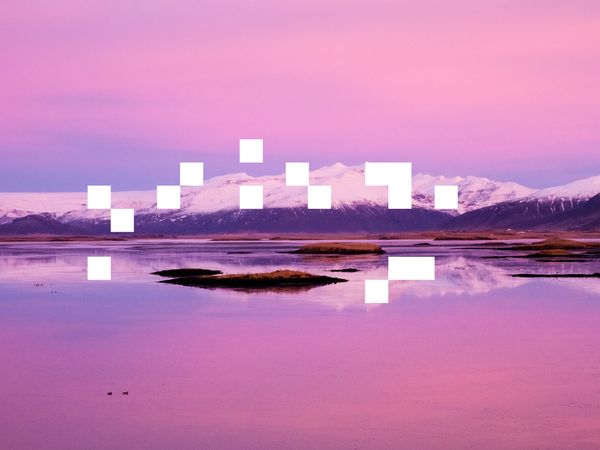 © A. Tamboly - Höfn in south of Iceland with the mountains covered with snow. Worth mentioning that this image was taken in Winter