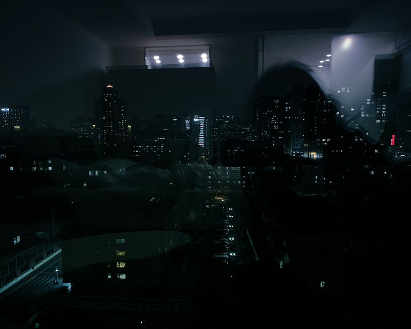 © Alexandra Dautel - Beijing and me refleting in the window, personal photograph, March 2024