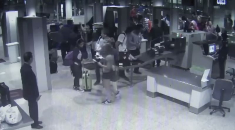 © Alexandra Dautel - CCTV from the passengers entering the plane, my friend with her green suitcase and purple bagpack, March 2014
