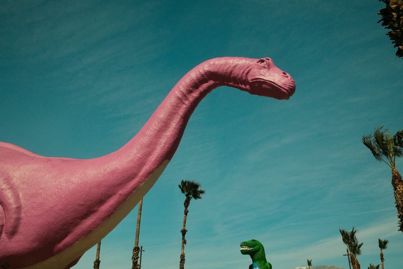 © Gem Redford - Cabazon, CaliforniaPink dinosaur sculpture at roadside attraction.