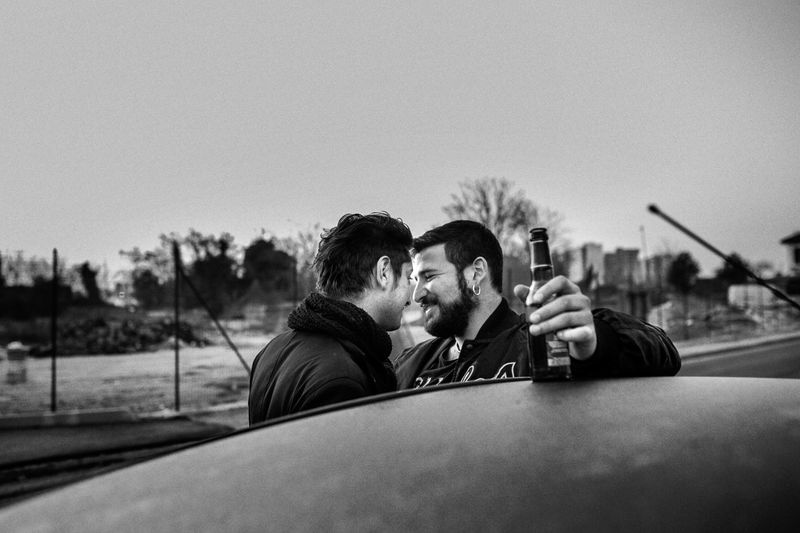 © Gianluca Abblasio - 2015 Rome - Italy. The Sun is raising. Time for the last beer with a friend.