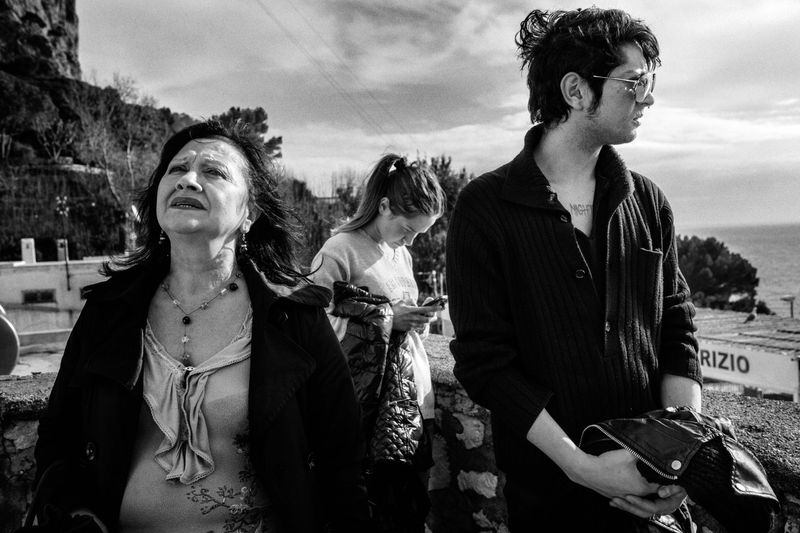 © Gianluca Abblasio - 2015 Capri - Italy. Dario with his mother and his sister .