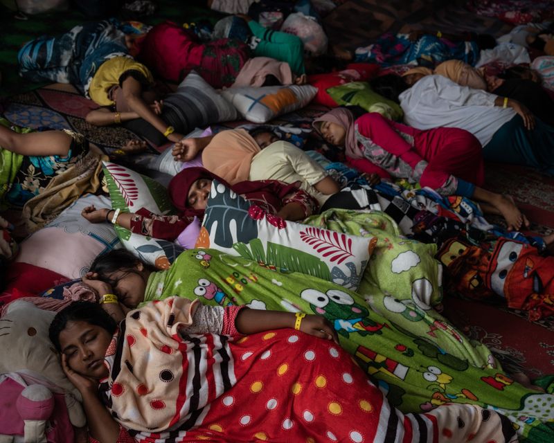 © Reza Saifullah - Rohingya women sleep in their tent at a temporary shelter in Meulaboh, Indonesia, on Wednesday, April 3, 2024.