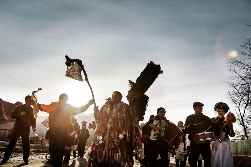 © Alessandro Vincenzi - A group of people led by a Jewish mask is walking across the streets of Krasnoilsk early morning on the 14th of January.