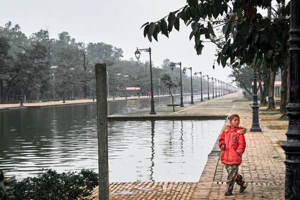 © tibhesh - A young girl roaming around Lumbini, waterway during school hours.