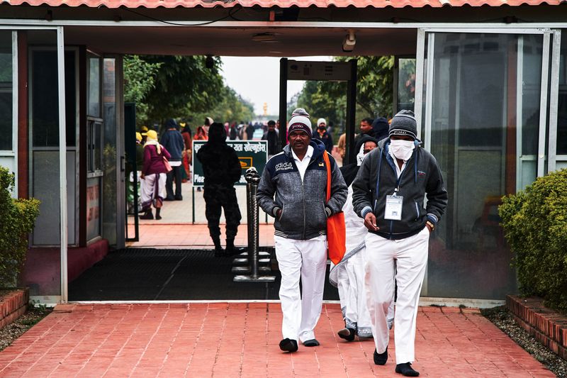 © tibhesh - Pilgrims enter Mayadevi Temple through the security gate.