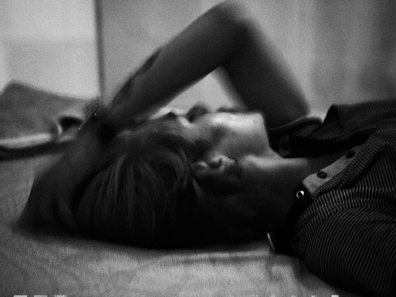 © Toni Arnau - Rar, 22, tries to sleep after smoking with his friends in a hotel room. Phnom Penh, Cambodia, 2017.