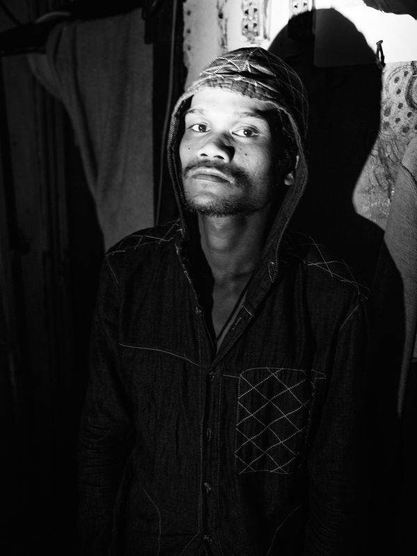 © Toni Arnau - Yark in his house. He has no electricity at home, the little money he gets he spends on drugs. Phnom Penh, Cambodia, 2017.