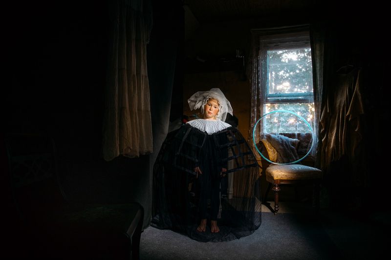 © Mari Saxon - Self-contained (A girl like a bird in a cage, yet she doesn’t try to escape — she is frozen, like a toy.)