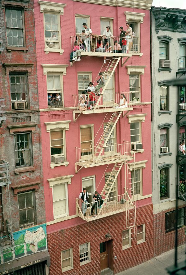 © Tria Giovan - Fire Escape Viewing on Stanton Street-1990. From the series Loisaida Street Work-1984 to 1990.