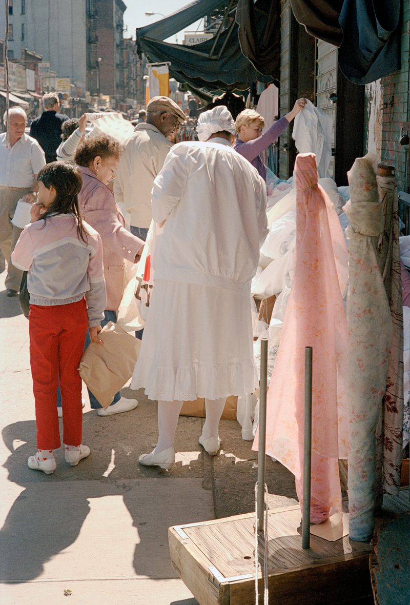 © Tria Giovan - Shopping on Orchard Street-1985. From the series Loisaida Street Work-1984 to 1990.