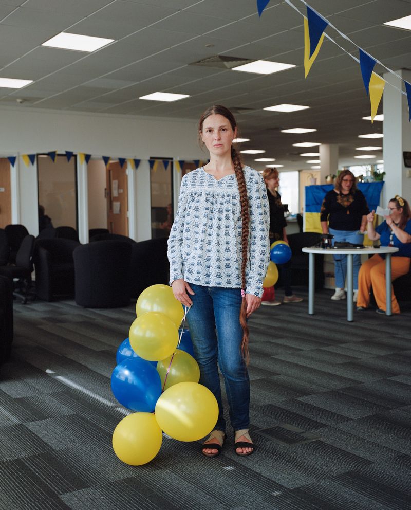 © Frankie Mills - Olga Mariaa Toms photographed at her English language school on Ukrainian Independence Day, Plymouth, 2023.