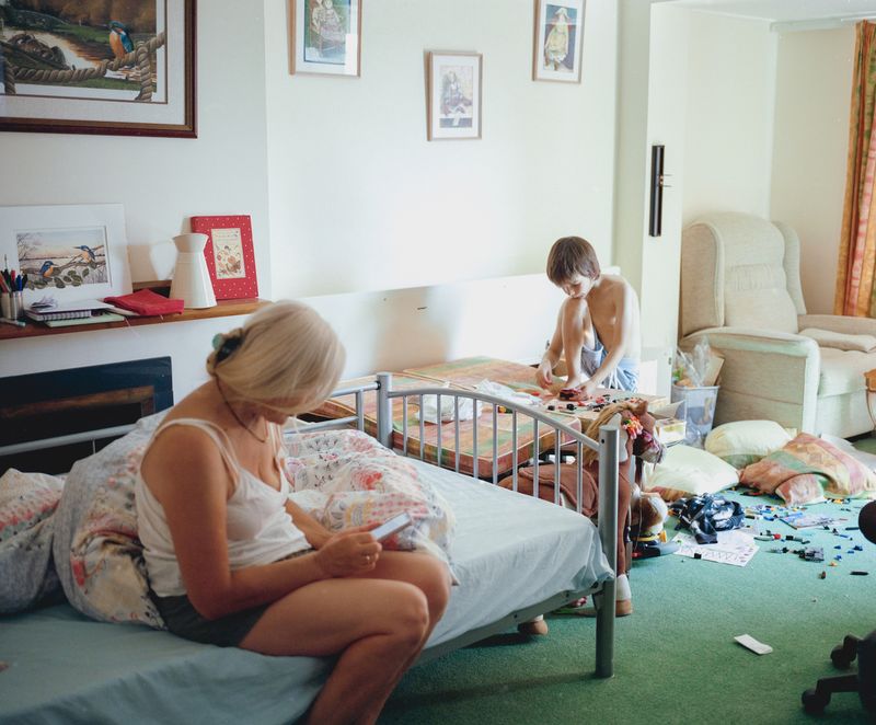 © Frankie Mills - Matvi Popko and grandmother photographed in their sponsors spare bedroom after recently arriving to the UK.