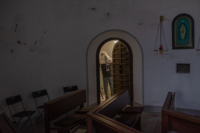 © Yakob-Aziz König - Josef Fuchs in the chapel of resurrection on the cemetery of the nameless. Vienna, Austria, December 2022.