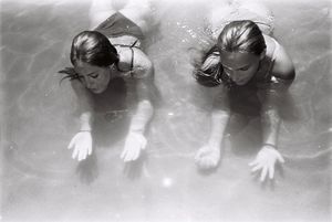 We dive between the sparkless in the light blue sea
