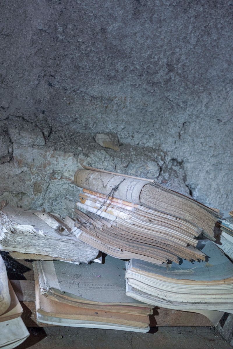 © Flavia Piola - In the attic of Costanza’s childhood home, I found her books left in a state of abandonment.