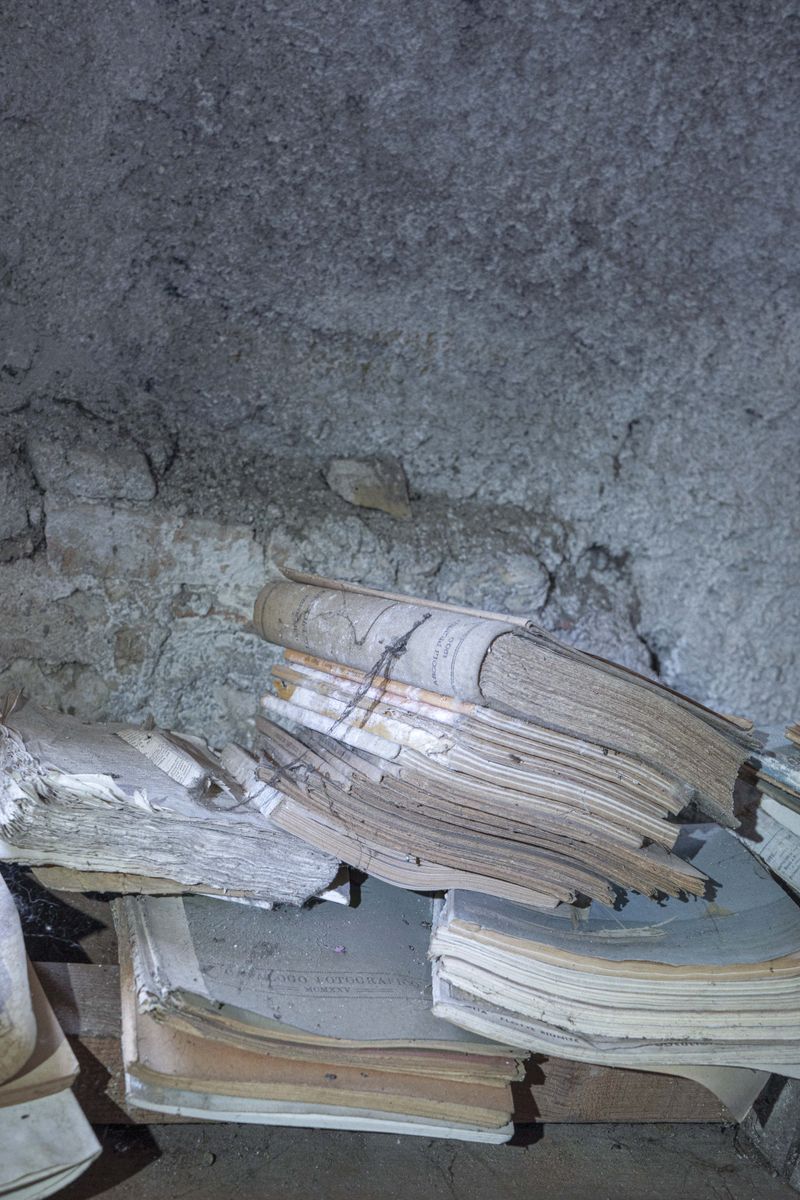 © Flavia Piola - In the attic of Costanza’s childhood home, I found her books left in a state of abandonment.