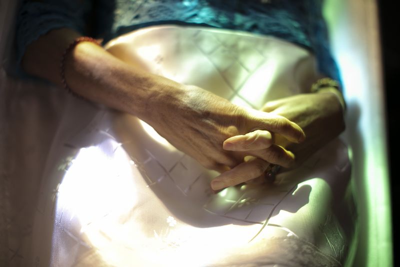 © Maria Konstanse Bruun - I photographed my mum's hands in her coffin upon our last visit to see her before the funeral.
