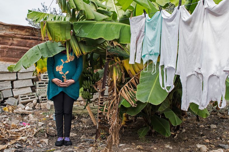 © Tanya Habjouqa - A young mother in her garden in JIftlek, Occupied West Bank. She just discovered she is expecting twins.