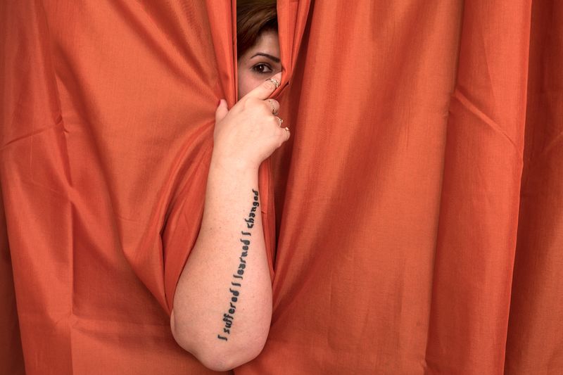 © Tanya Habjouqa - Sally shares her new tattoo. 'I suffered, I learned, I changed."