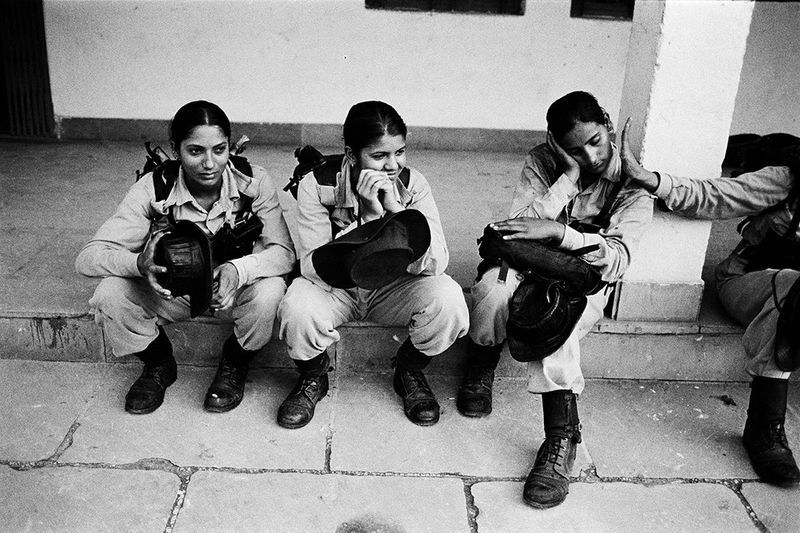 © Poulomi Basu - During lunch break at the mess. Khatka Camp, July 2009.