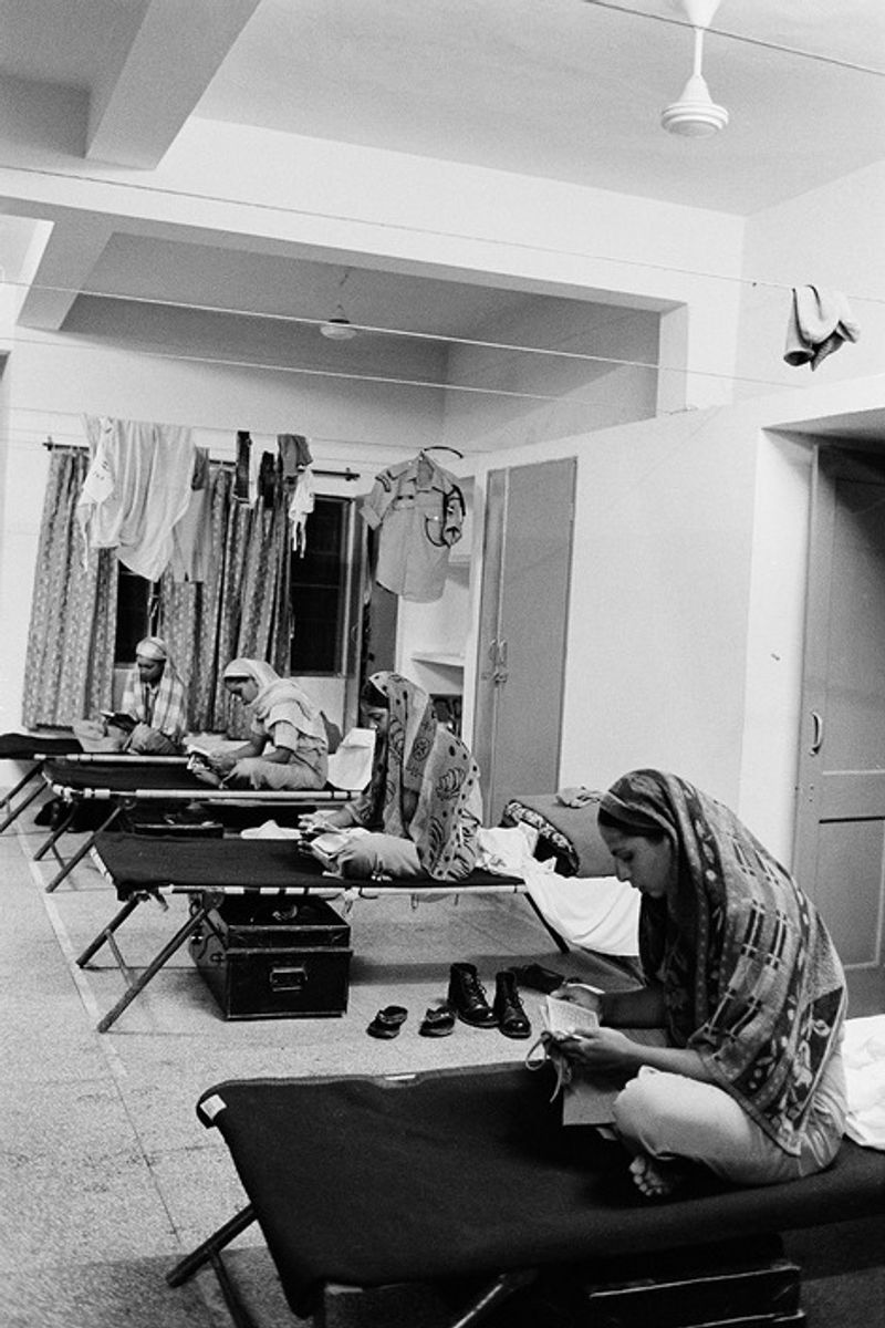 © Poulomi Basu - Namaaz Time for the Muslim women in the force, boot camp in Khatka. September 2009