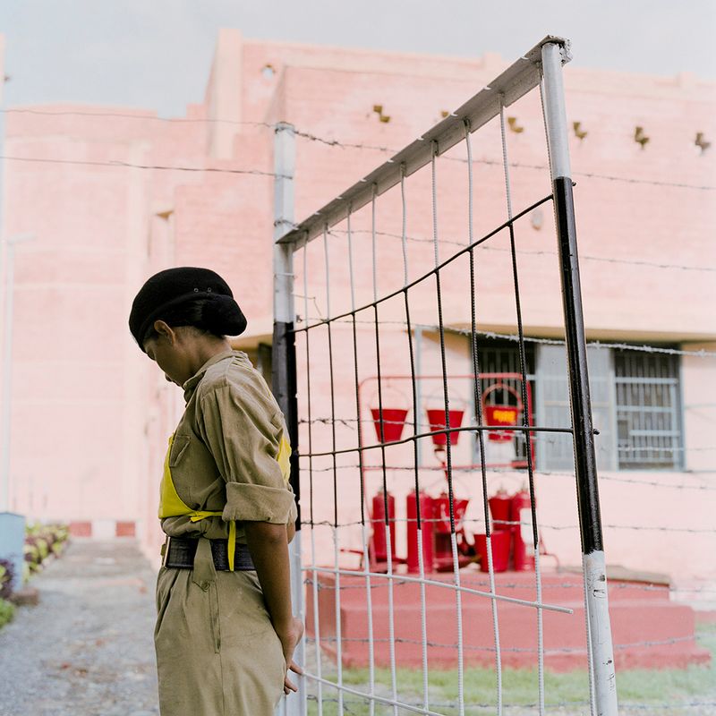 © Poulomi Basu - Woman looking away during obstacle training, Kharkan, July 2009.