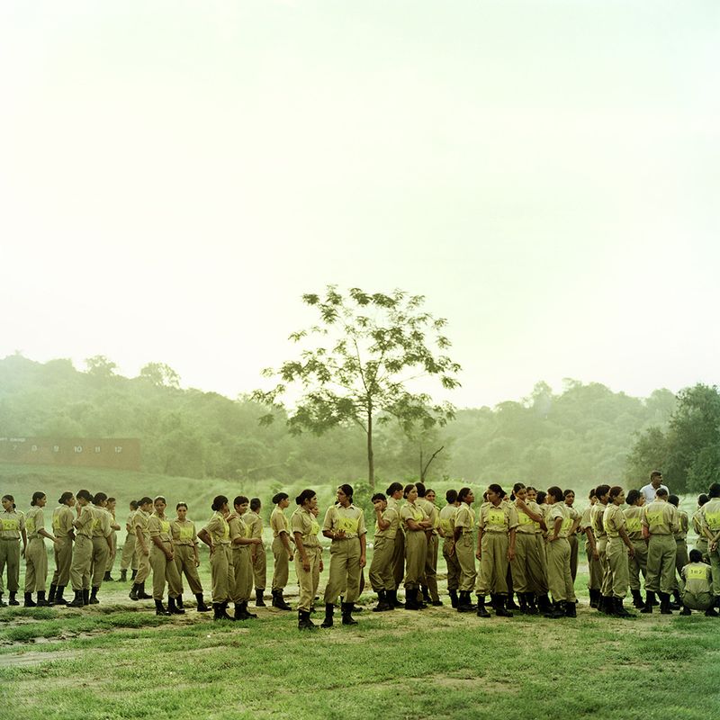© Poulomi Basu - PBASU_TCHL_018 Alpha coy of 118 women at dawn wait for their training to begin. Khatka Camp, Punjab, June 2009.