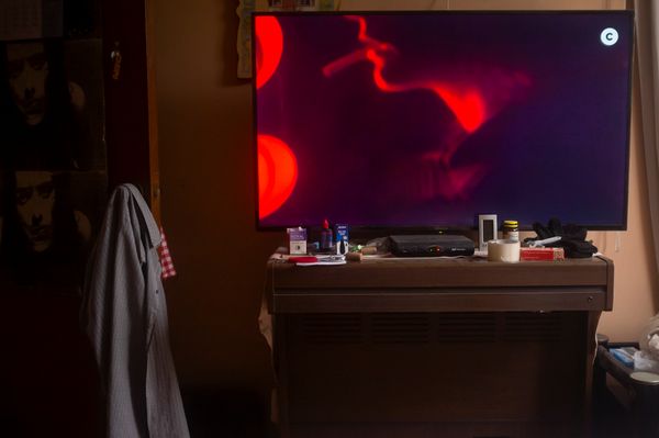 © Rochi  Leon - 'Die Hard' is playing on TV in my dad's bedroom. He enjoys watching old movies over and over again.