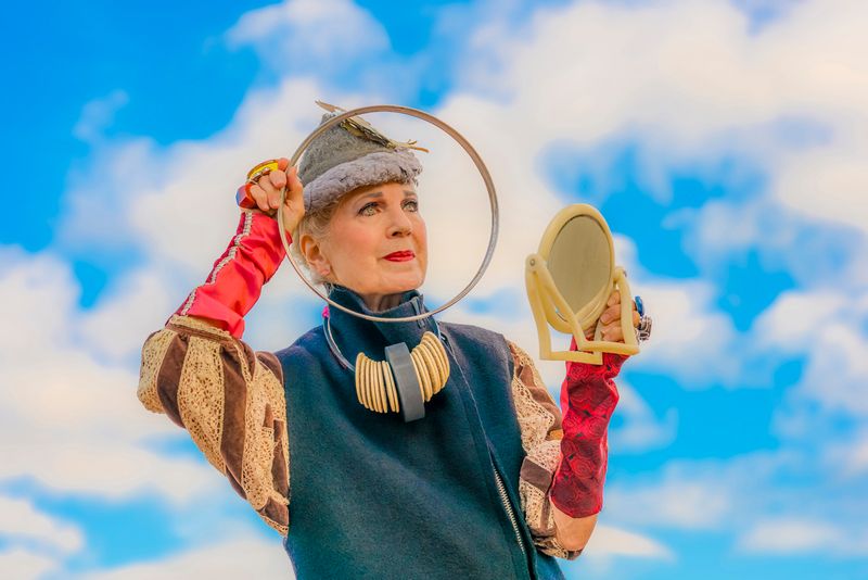 © Natalia L Rudychev - Debra Rapoport modeling her hat created out of the dryer lint.
